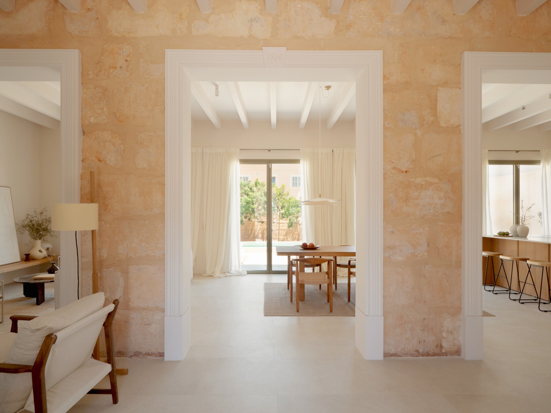 Stone-walled entrance hall with exposed ceiling beams